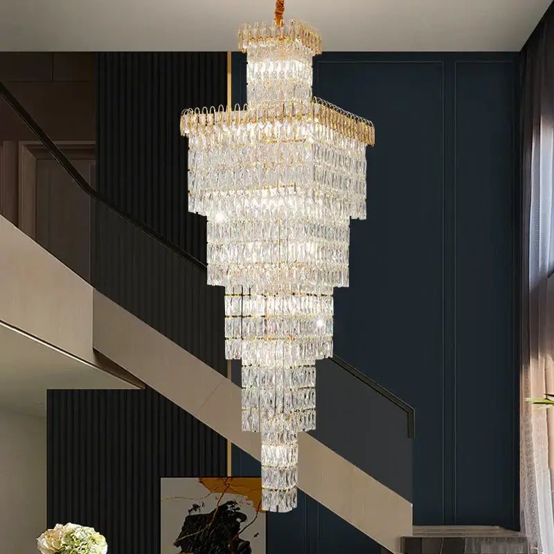 Modern gold crystal hollow stair chandelier with multi-tiered crystal and gold-toned accents for elegant decorbites stair lighting