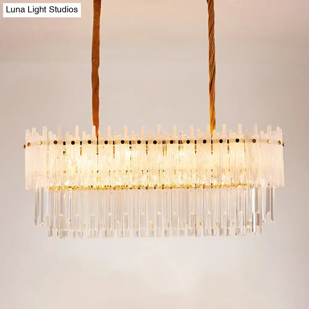 A modern decorbites minimalist 9-light crystal chandelier with clear glass rods and frosted accents for dining room island lighting