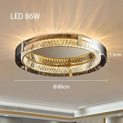Modern gold crystal led ceiling chandelier with two concentric faceted crystal rings and polished chrome decorbites crystal led