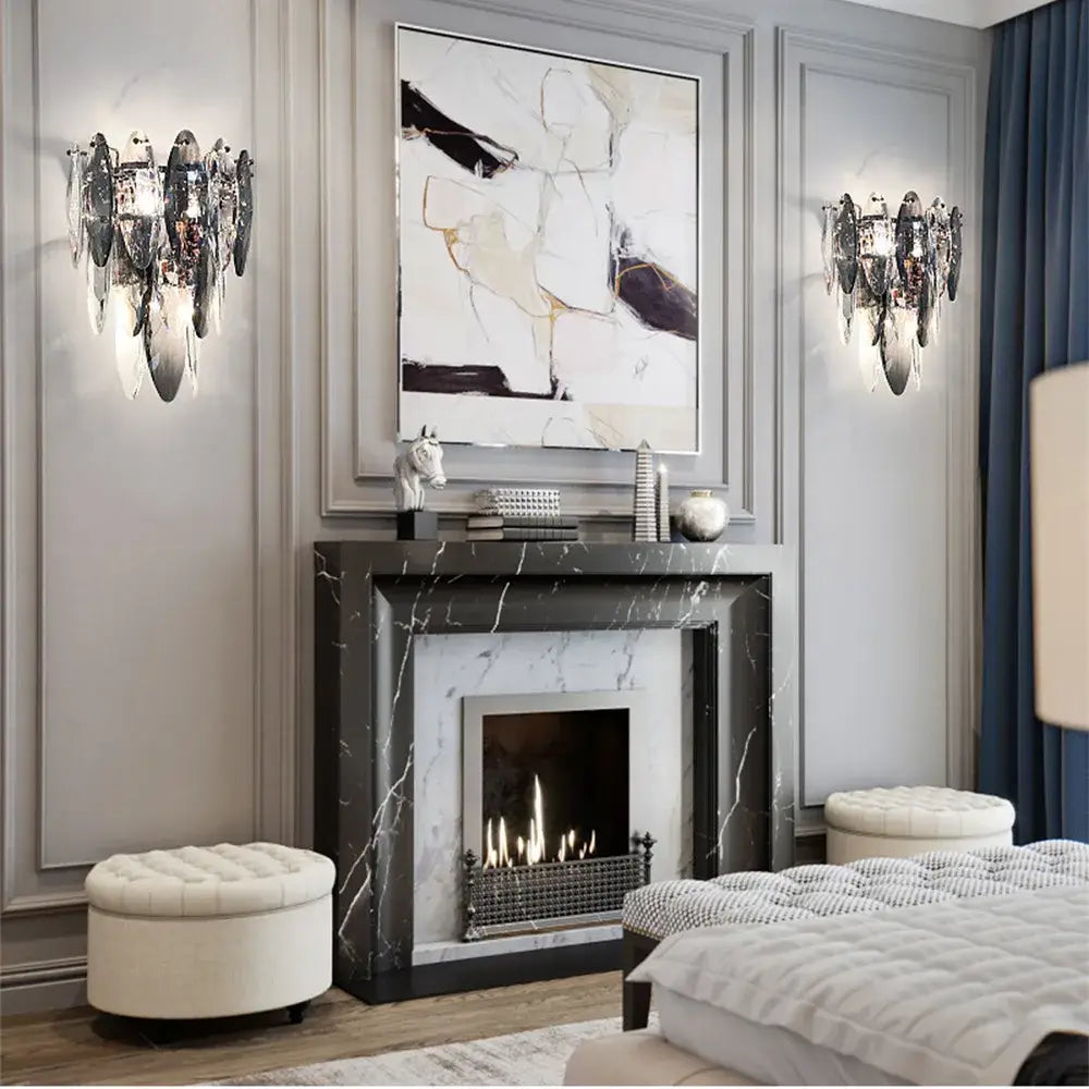 Black marble fireplace with silver firebox under modern gold crystal led ceiling chandelier for elegant decorbites crystal led decor