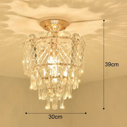 Modern gold crystal led ceiling chandelier with cascading clear prisms and teardrop crystals for dining room decorbites crystal led