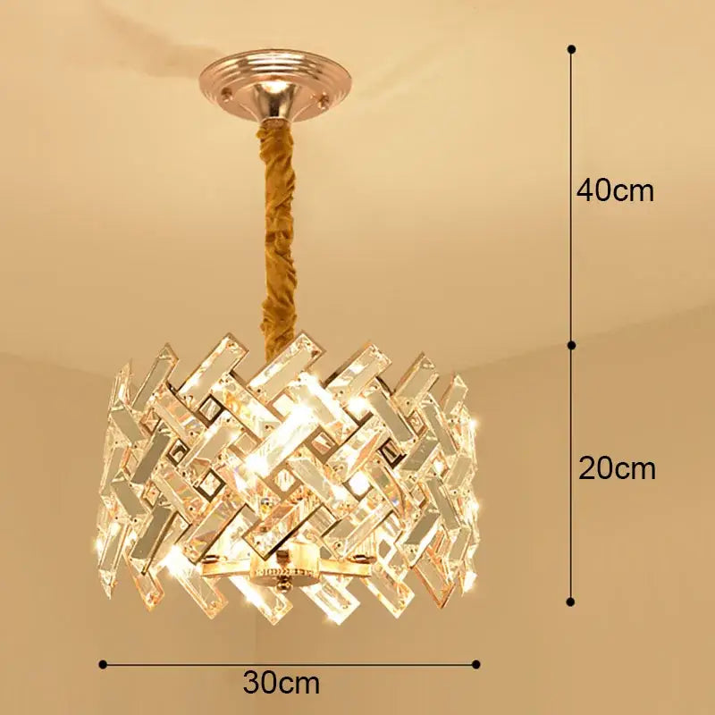 A modern gold crystal led ceiling chandelier with intricate geometric design and woven fabric cord for dining room decorbites crystal led