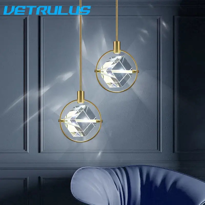 Two elegant gold crystal led ceiling pendant lights with faceted globes and brass cords for modern decorbites crystal led decor