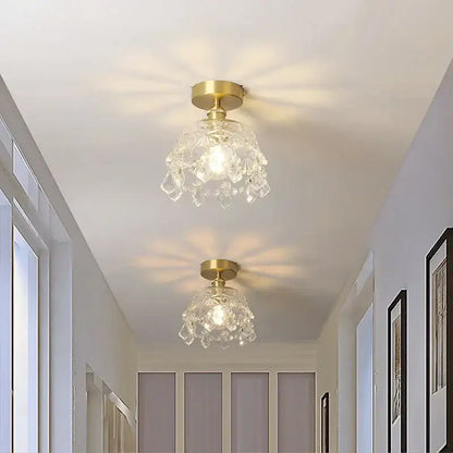 Gold-finished modern chandelier ceiling light with crystal-encrusted glass shade radiating warm illumination decorbites crystal led