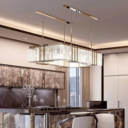 Modern gold crystal led chandelier with vertical crystal rods and polished metal frame for dining room decorbites crystal led