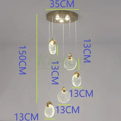 Modern gold crystal led chandelier featuring five frosted glass orbs and brushed metal mount for dining room decorbites crystal led