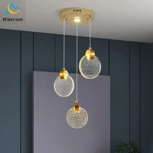 Modern gold crystal led chandelier with gold-toned circular pendant lights and textured glass shades for dining room decorbites crystal led