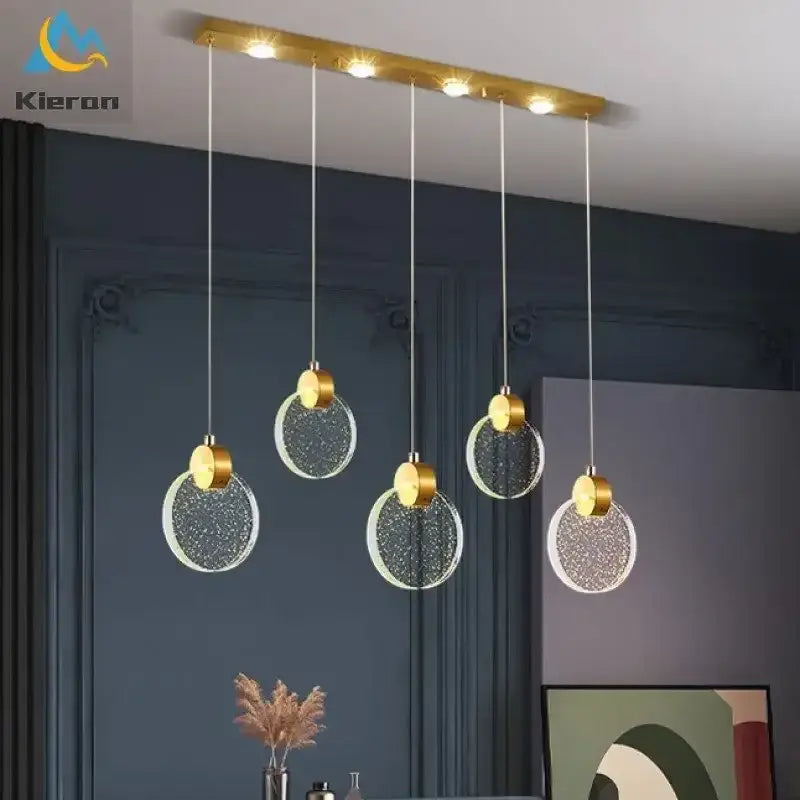 Modern gold crystal led chandelier with clear circular glass shades from decorbites crystal led collection for dining rooms