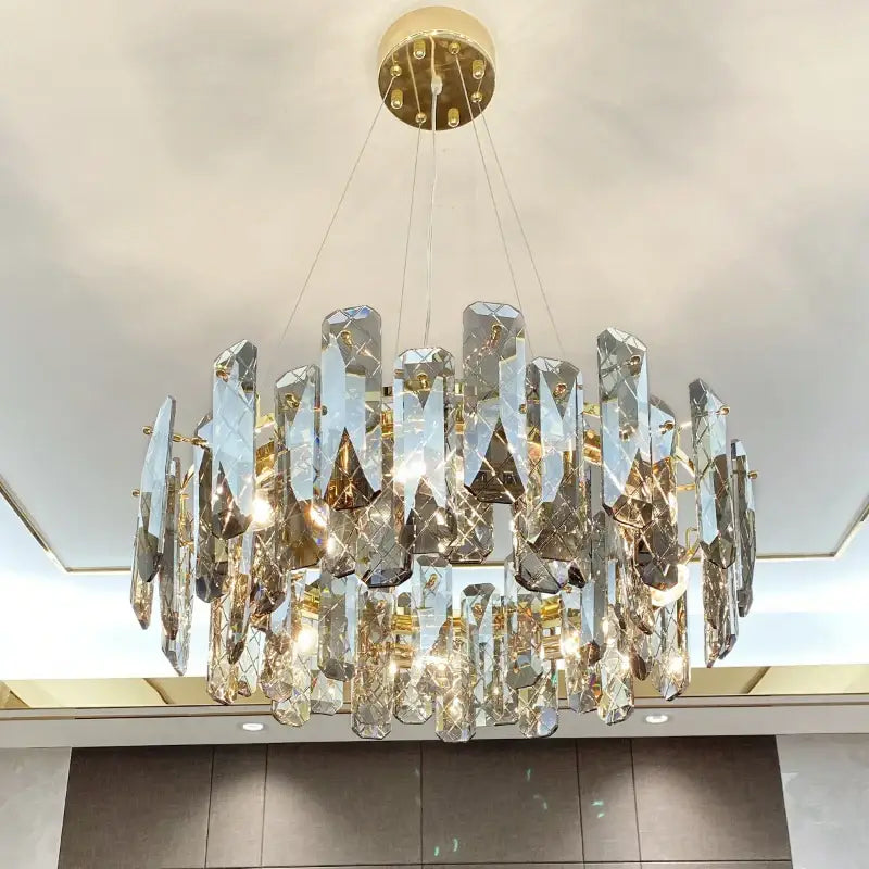 Modern gold crystal led chandelier with faceted glass pieces by decorbites for dining room decor
