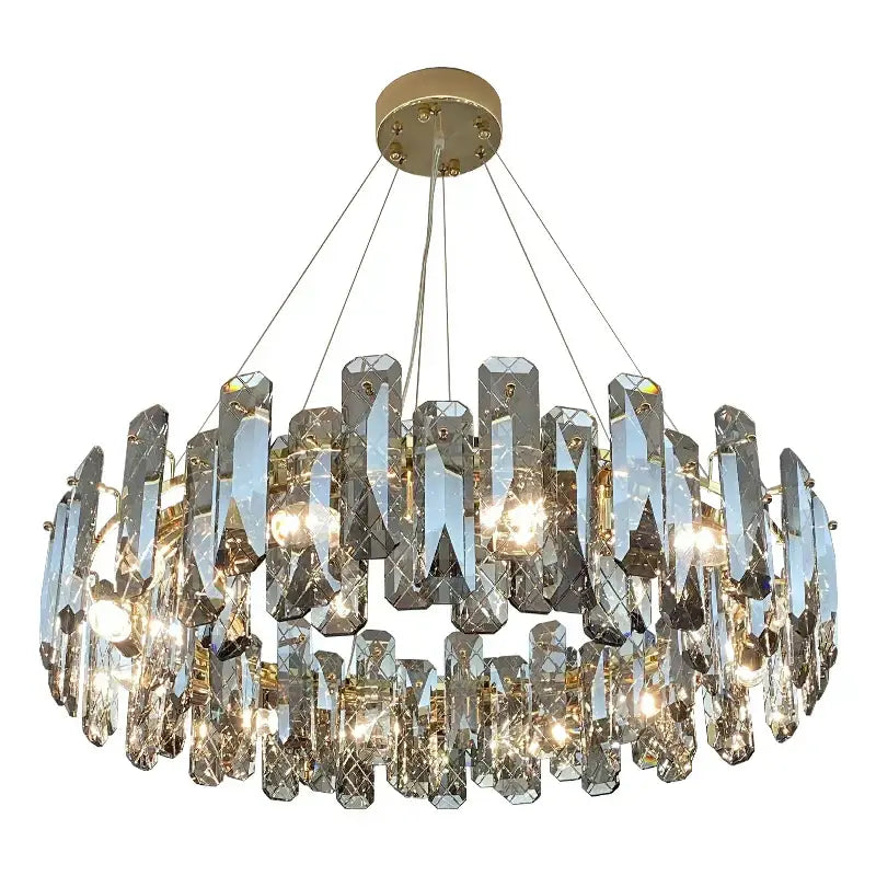 A modern gold crystal led chandelier with multiple tiers of faceted prisms for dining room decorbites crystal led