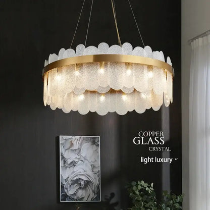 A modern decorbites crystal led chandelier with gold metal frame and frosted glass petals emitting warm light