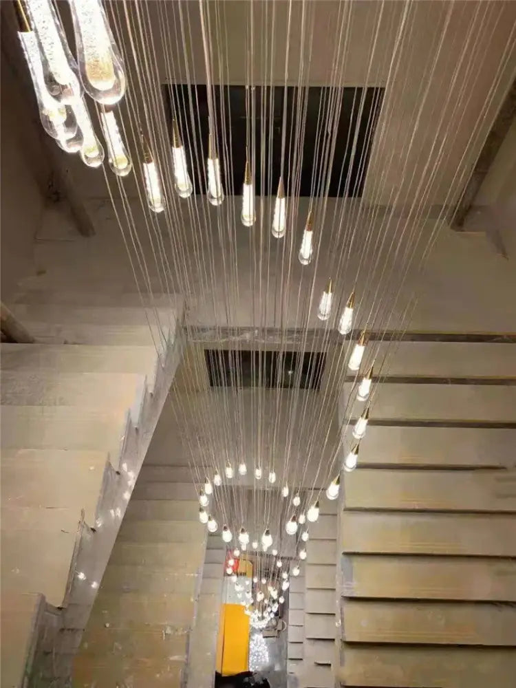 Modern gold crystal led chandelier pendant light with cascading clear crystal teardrop pendants for dining room decorbites crystal led