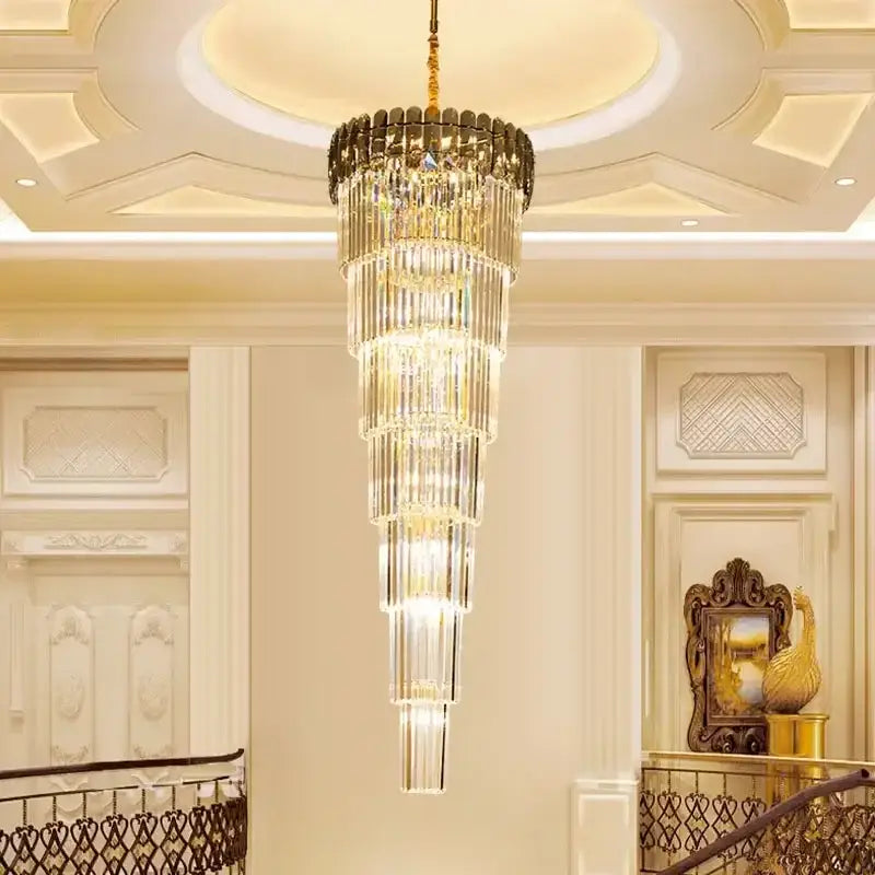 A tiered modern gold crystal led pendant chandelier with gold-toned metal accents for dining room decorbites crystal led