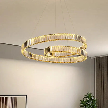 Modern gold-toned double-ring crystal led pendant light with faceted accents for dining room decorbites crystal led
