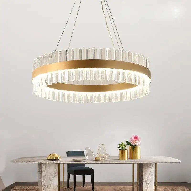Modern gold crystal led ring chandelier with clear crystal prisms and metal frame for elegant dining room lighting decorbites crystal led