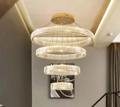 Modern gold crystal led ring chandelier with cascading crystal rings and gold-toned ceiling mount for stairwell decorbites crystal led