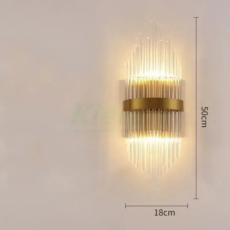 Modern gold crystal led wall lamp featuring clear glass rods radiating from a central brass band for bedroom decorbites crystal led wall