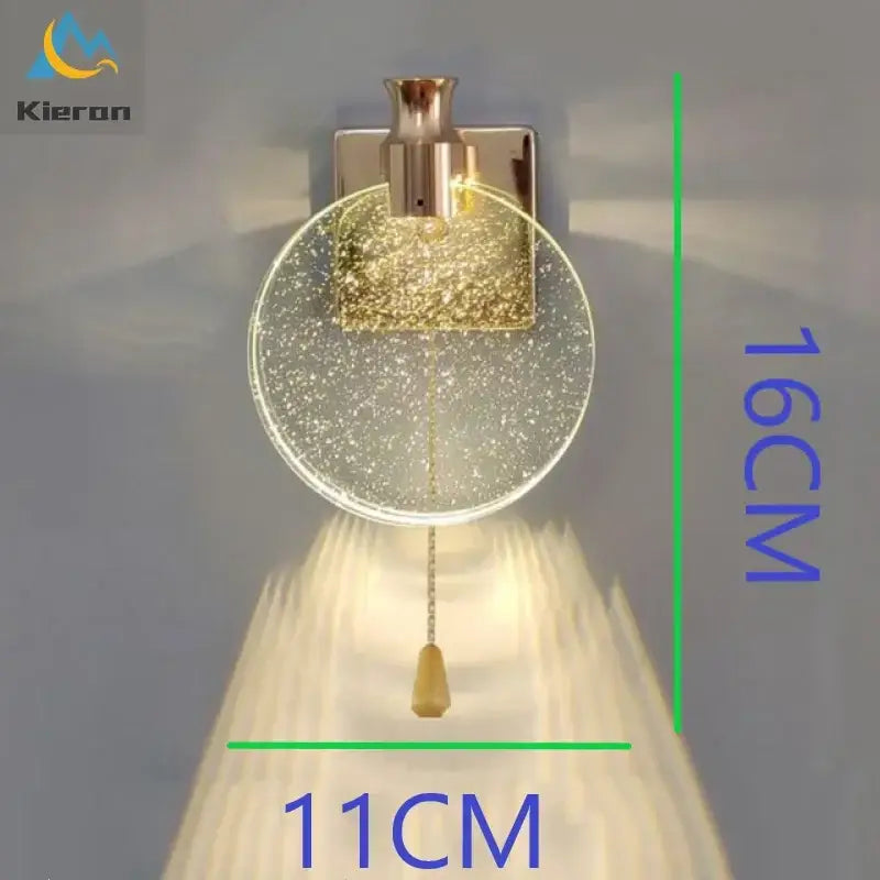 Modern gold crystal led wall lamp with clear glass globe shade filled with glitter and wooden pull chain decorbites crystal led