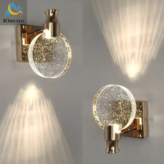 Modern gold-toned wall lamp with a crystal led glass globe filled with sparkling particles for elegant bedroom decorbites crystal led wall