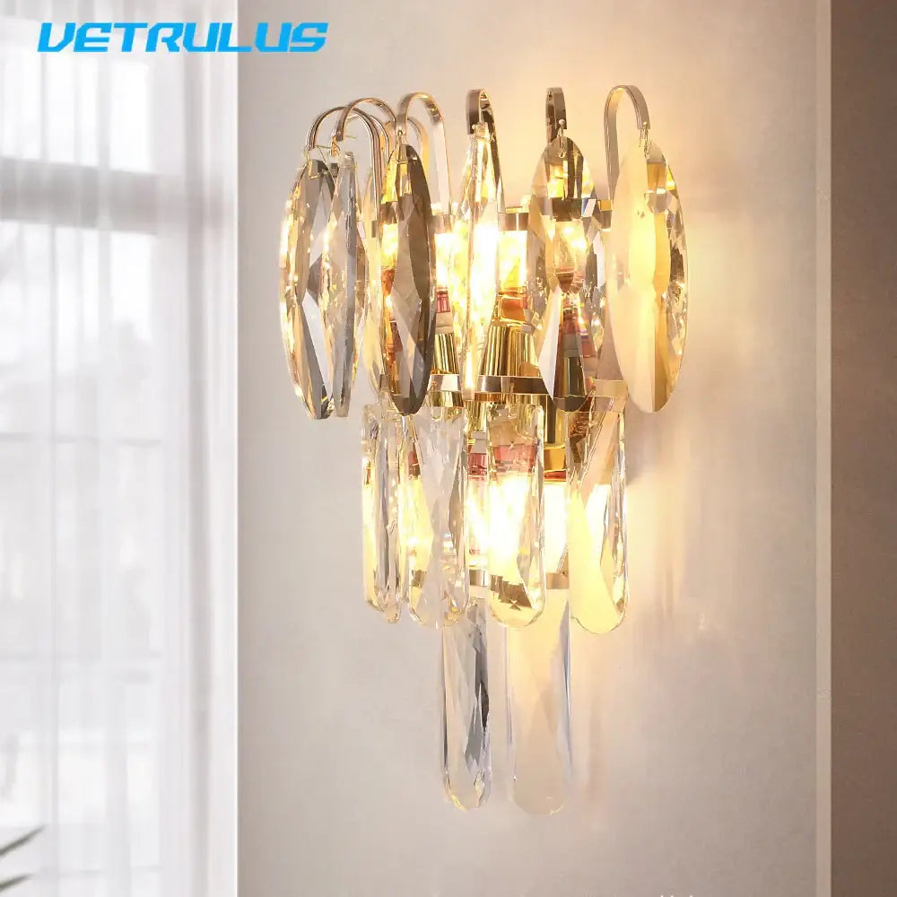 Modern gold crystal led wall lamp with cascading crystal droplets and circular glass accents by decorbites crystal led