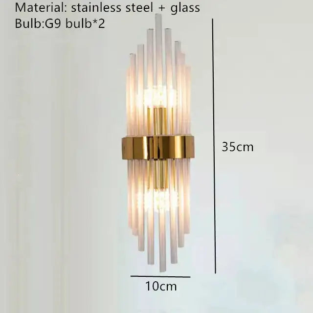 Modern gold crystal led wall lamp with vertical translucent glass rods and polished gold stainless steel accents decorbites crystal led