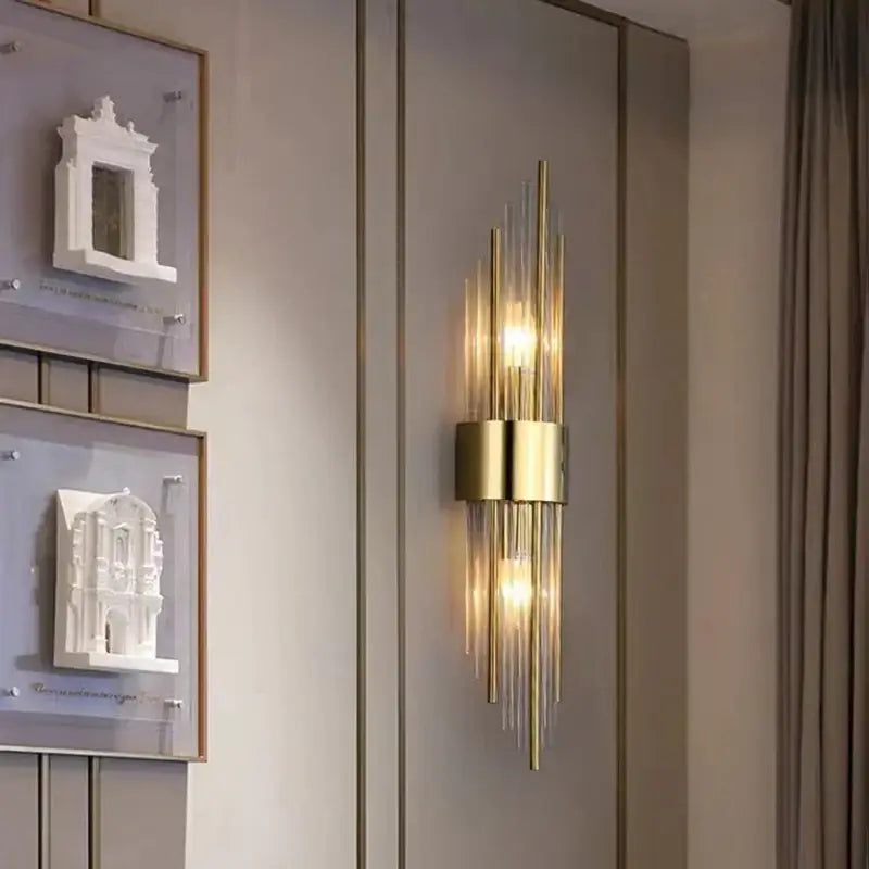 Modern gold crystal led wall lamp bedroom sconce with vertical glass rods and central cylindrical base decorbites crystal led