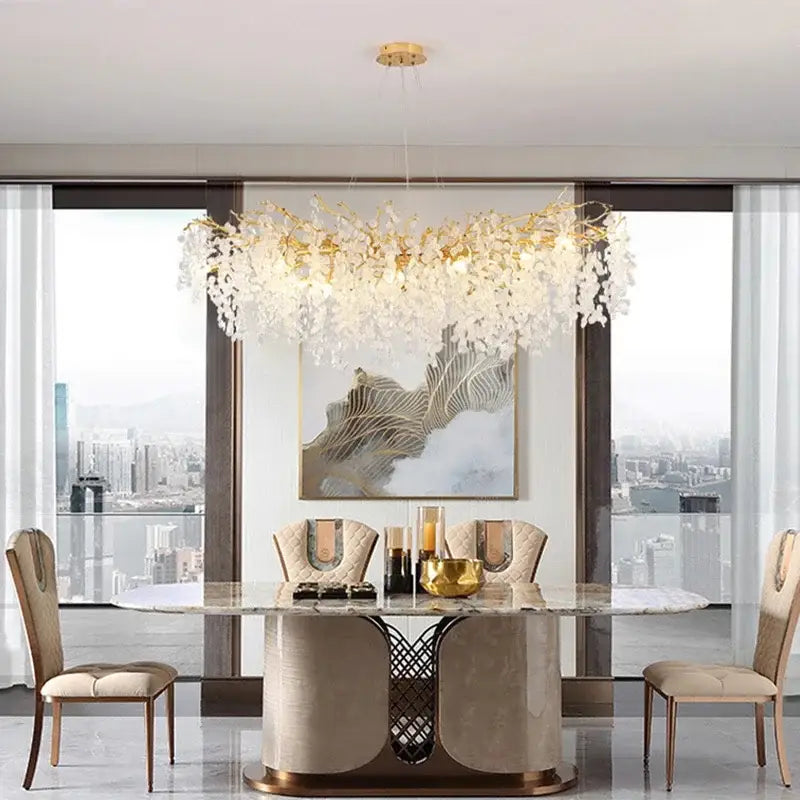 Modern gold crystal money tree chandelier with leaf-like crystal droplets on a central golden frame for living room decor