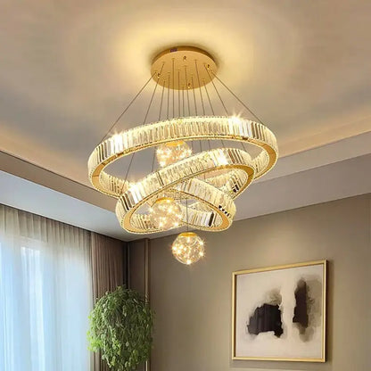 Modern gold crystal multi ring pendant light with golden spiral chandelier and brushed stainless finish for dining room