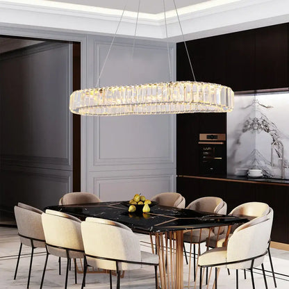 A modern gold crystal oval led chandelier with clear rods and warm glow perfect for living room decorbites crystal oval