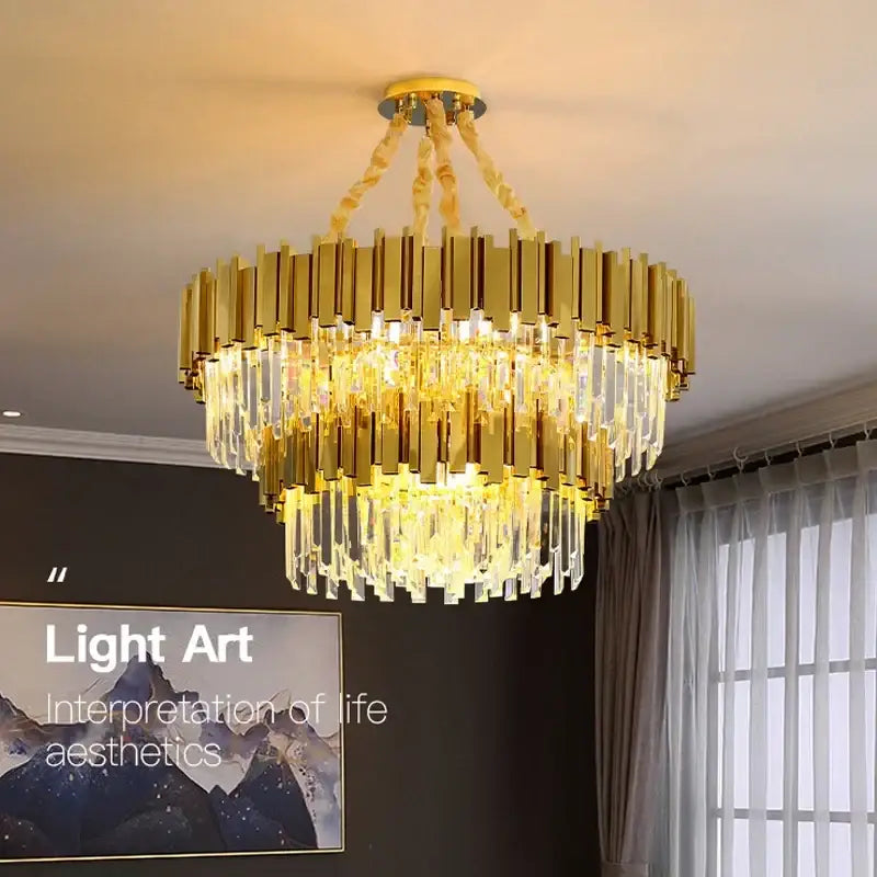 Modern gold crystal oval round chandelier with cascading crystal prisms and twisted brass chains for dining room decorbites crystal oval