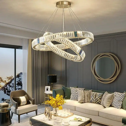 Modern gold crystal pendant chandelier led dining room light with clear crystal segments and blue accents from decorbites crystal pendant