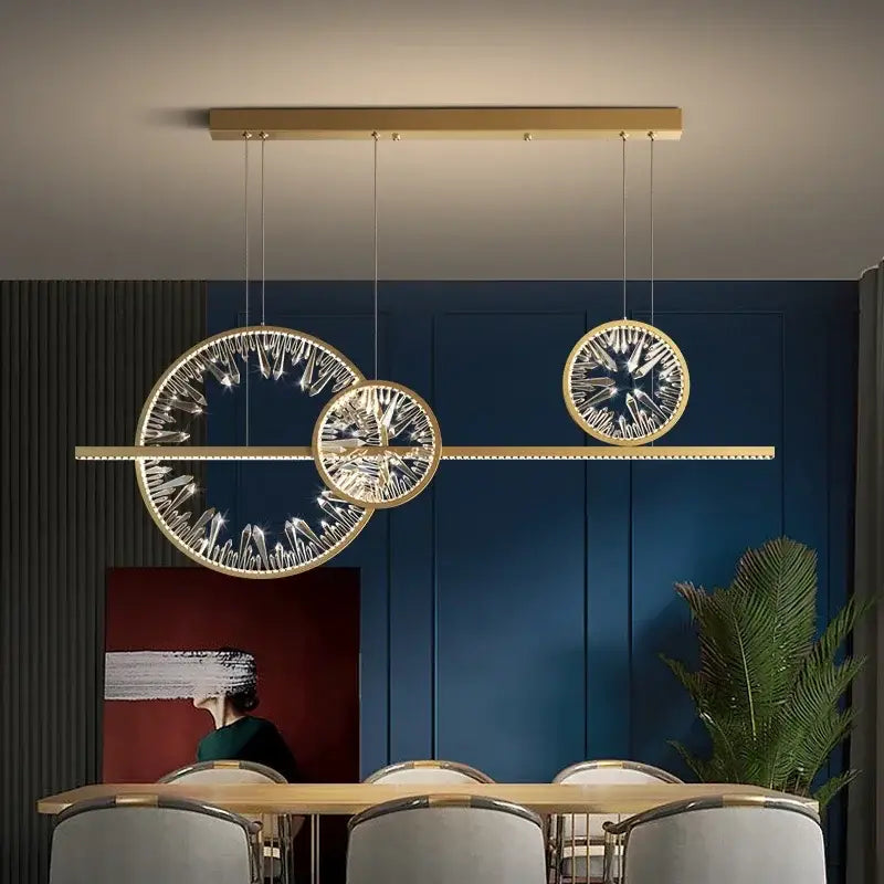 Modern gold crystal ring chandelier pendant light with three circular crystal-encrusted rings for living room use