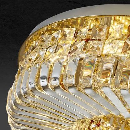 Modern gold crystal ring led ceiling lamp featuring a gold-toned crystal ring led chandelier with layered curved glass decorbites crystal ring