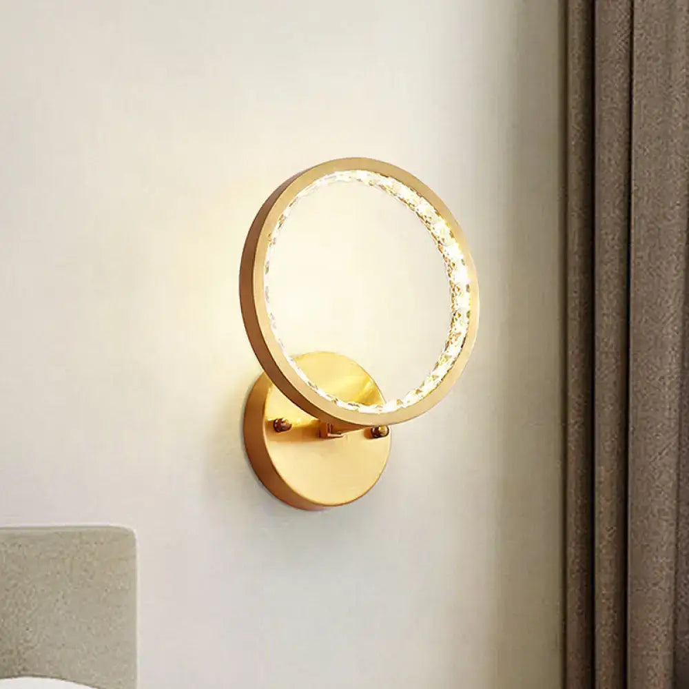 Modern gold crystal ring wall lamp with bulb base and 110v-120v emits warm light for bedroom use