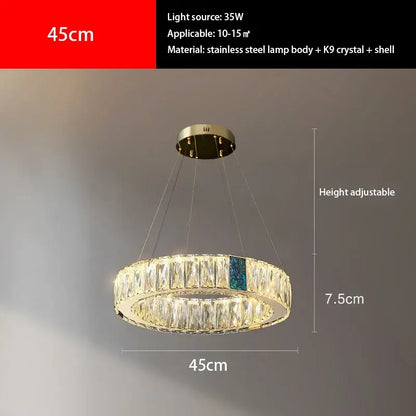 Modern gold crystal round ceiling chandelier with stainless steel frame and clear k9 crystals plus blue accent for dining room decorbites crystal round