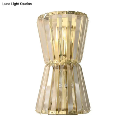 Modern gold crystal shade wall mounted light featuring vertical faceted panels for corridor sconce lighting
