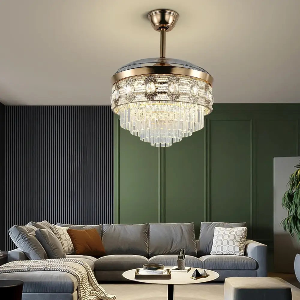 A modern gold crystal smart ceiling fan with brass frame and cascading clear glass prisms for living room use
