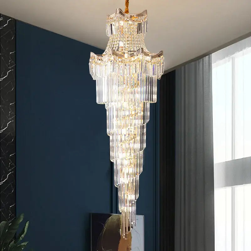 Modern gold crystal stair chandelier with cascading clear glass prisms and gold-toned metal for living room decorbites crystal stair