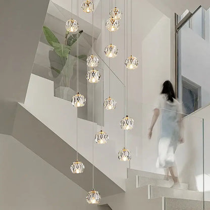 Modern gold crystal stair football shaped chandelier with spherical glass globes and gold metal frames for stairwell decorbites crystal stair