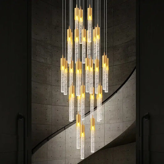 Modern gold crystal staircase chandelier with clear bubble-filled glass tubes and warm led lights for stairwell decorbites crystal staircase
