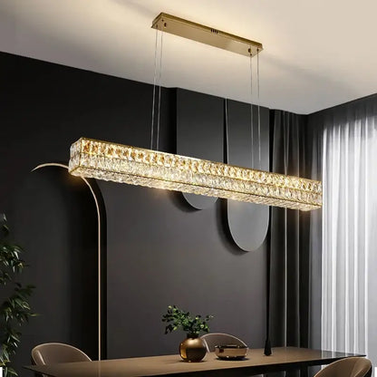 Modern gold crystal steel led pendant light with faceted crystal accents for dining room decorbites crystal steel decor