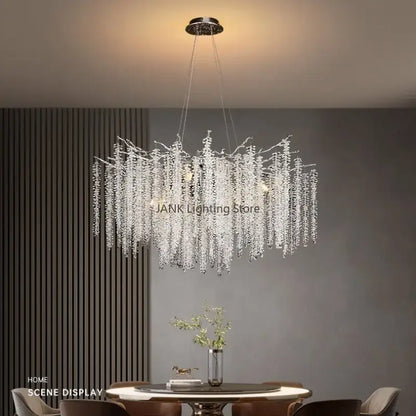 Elegant modern gold crystal tassel pendant chandelier with cascading clear faceted crystals in polished chrome mount
