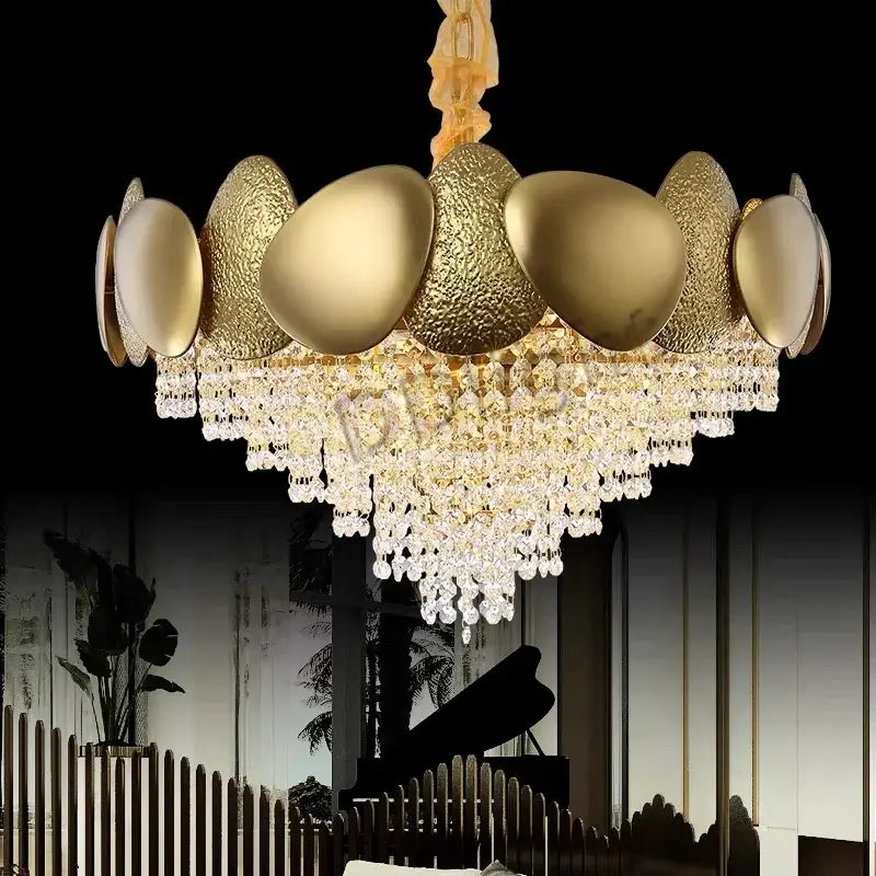 Modern gold crystal tassles pendant light featuring textured egg-shaped metallic orbs and cascading crystal droplets for living room decorbites crystal tassles pendant