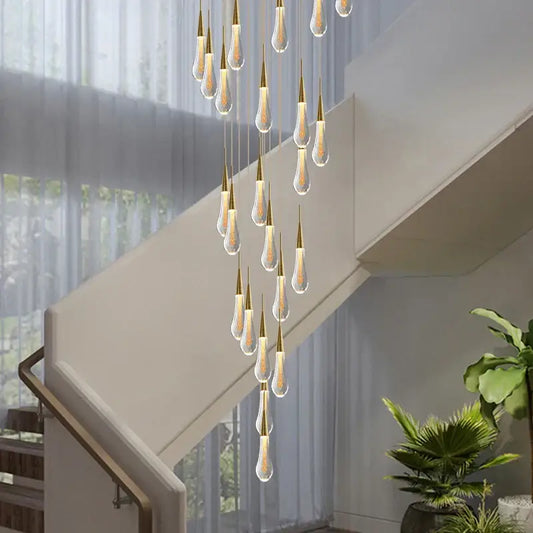 Modern gold crystal tear drop led pendant light with multiple glass pendants and gold-toned tops for dining room decorbites crystal tear ceiling