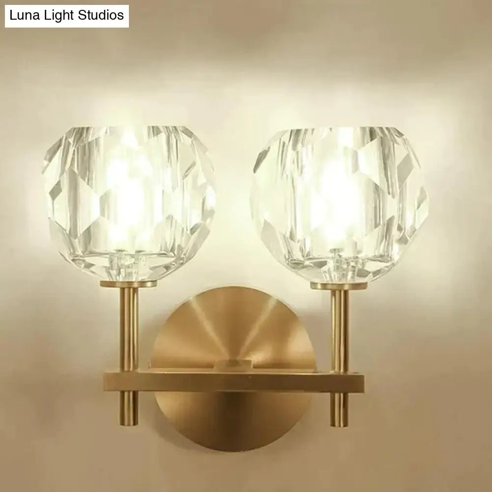 Brass-finished decorbites ivy wall lamp with two faceted crystal globe shades crystal wall lamp