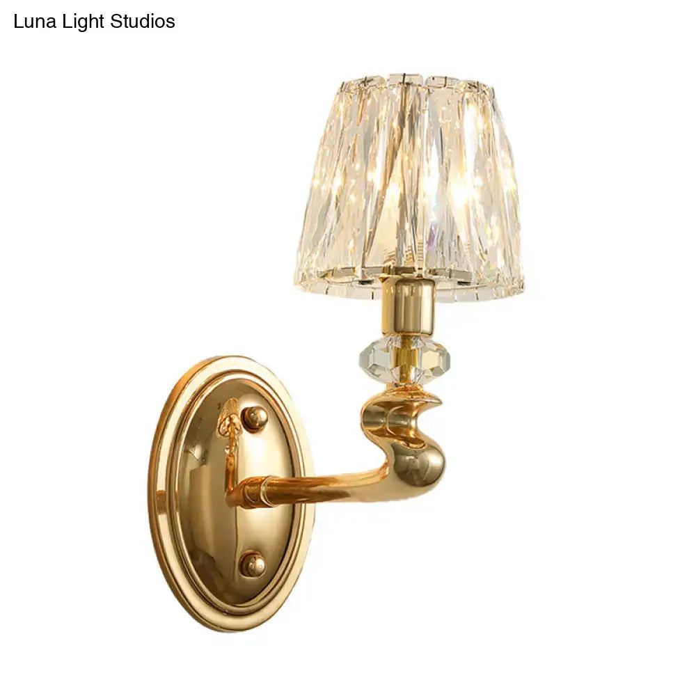 Modern gold wall light fixture with faceted crystal lampshade and decorative glass beads for bedroom use