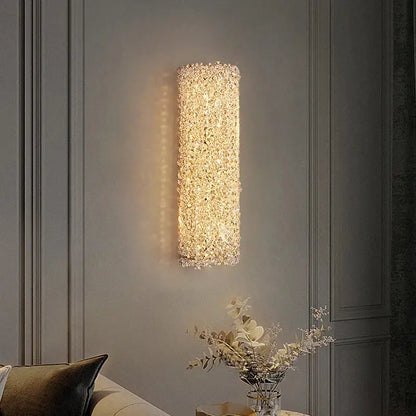 Modern gold crystal wall lights sconce with clear sparkling crystals emitting warm golden glow for bedroom night light decorbites crystal wall
