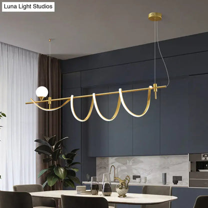 Modern gold curve island led pendant light with sleek curved design and integrated glass ball bulb for kitchen use