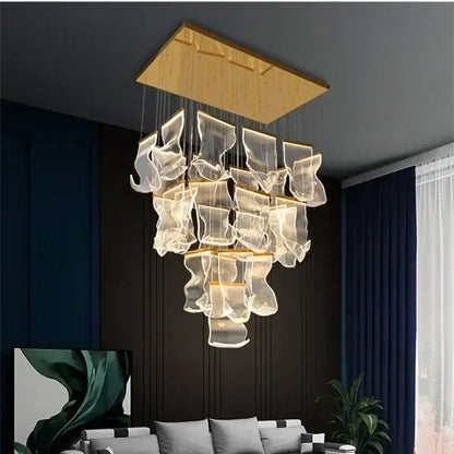 Modern gold decorbites acrylic leaf chandelier with a golden wooden frame and cascading translucent glass for dining room light