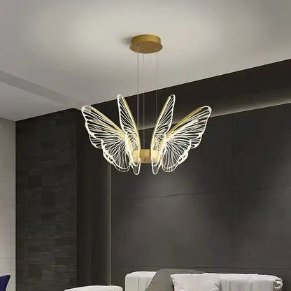 Gold-toned decorbites butterfly modern pendant light with illuminated delicate wireframe wings for dining room decor